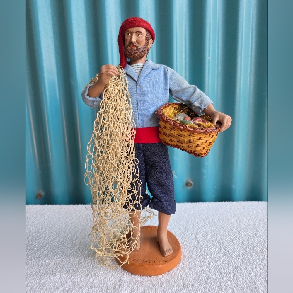 Vintage Handcrafted Fisherman Figurine with Red Hat and Blue Outfit Terra Cotta
